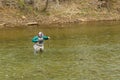 Fisherman Releasing a Trout Back into the Roanoke River, Virginia, USA - 2